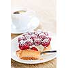 Fresh raspberry tart served with coffee for dessert