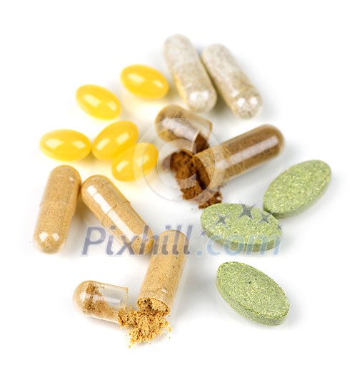 Mix of herbal supplements and vitamin pills isolated on white Mix of herbal supplements and vitamin pills isolated on white