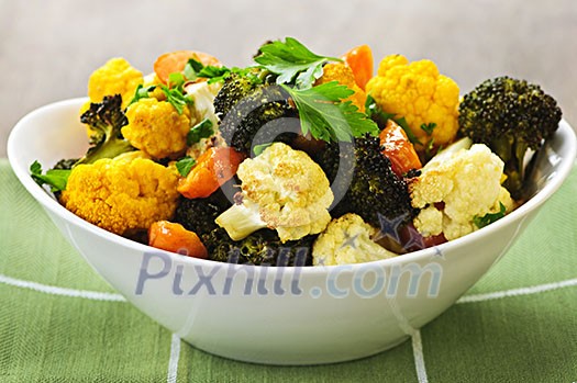 Vegetarian dish of fresh roasted organic vegetables Vegetarian dish of fresh roasted organic vegetables