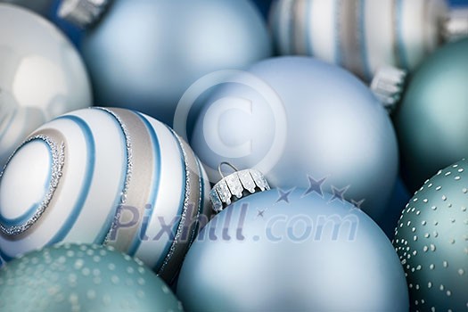 Close up of several blue Christmas glass baubles Close up of several blue Christmas glass baubles