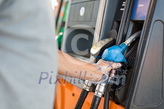 Car fueling at the gas station Car fueling at the gas station