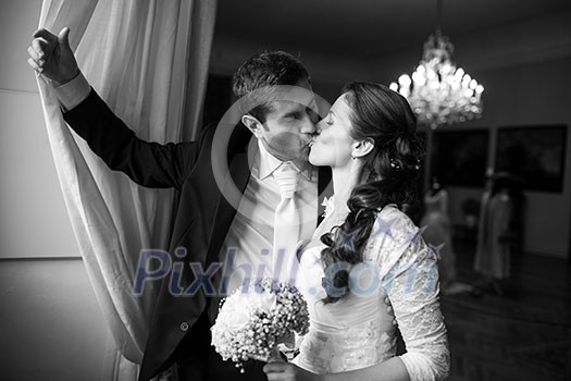 Gorgeous wedding couple kissing Gorgeous wedding couple kissing