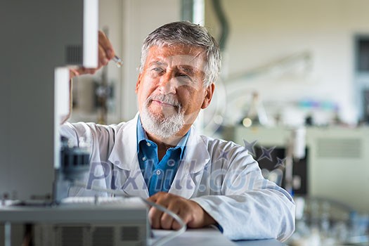 Senior chemistry professor/doctor in a lab (color toned image) Senior chemistry professor/doctor in a lab (color toned image)