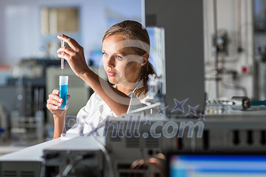 Portrait of a female researcher doing research in a lab (shallow DOF; color toned image) Portrait of a female researcher doing research in a lab (shallow DOF; color toned image)