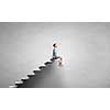Cute little boy with toy bear sitting on ladder of books