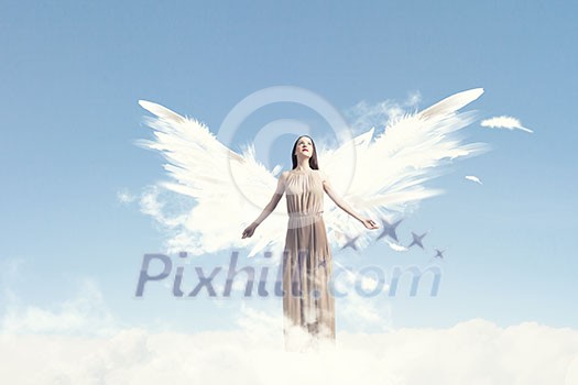 Attractive woman with angel wings on sky background Attractive woman with angel wings on sky background