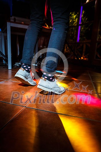 People on the dancefloor during a wedding celebration/party (motion blurred image) People on the dancefloor during a wedding celebration/party (motion blurred image)