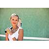 Portrait of a pretty young tennis player