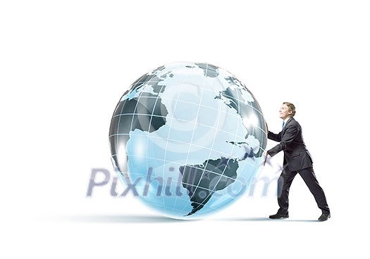 Determined businessman pushing big digital Earth planet Determined businessman pushing big digital Earth planet