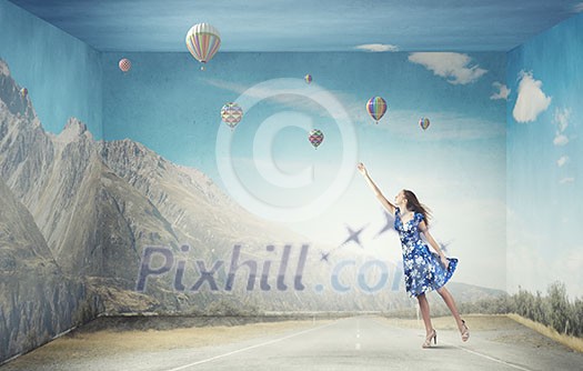 Young woman in summer dress flying in sky Young woman in summer dress flying in sky