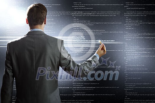 Rear view of businessman touching icon of media screen Rear view of businessman touching icon of media screen