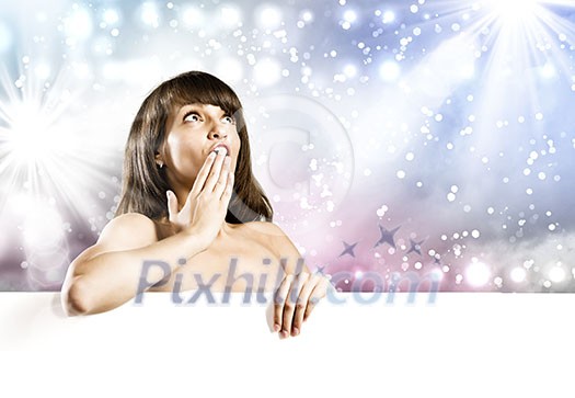 Young naked girl holding white blank banner. Place for text Young naked girl holding white blank banner. Place for text