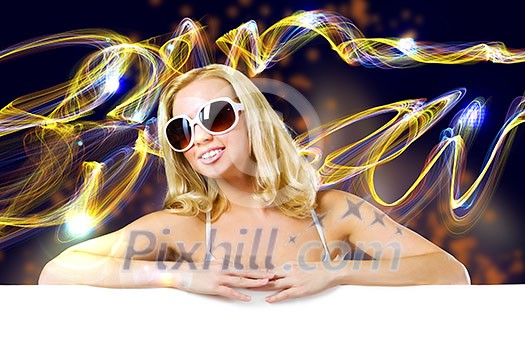 Young attractive blond in bikini holding blank banner Young attractive blond in bikini holding blank banner