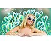 Young attractive blond in bikini holding blank banner