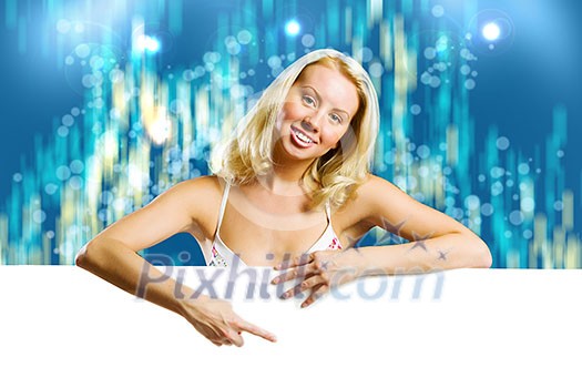 Young attractive blond in bikini holding blank banner Young attractive blond in bikini holding blank banner