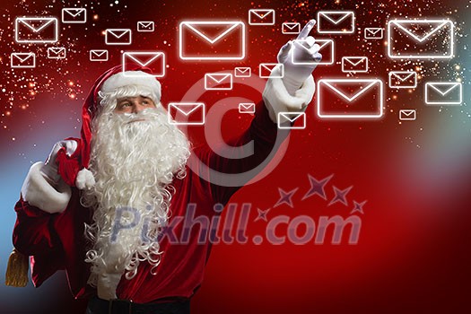 Santa Claus reading children letters with wishes Santa Claus reading children letters with wishes