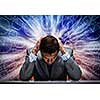 Troubled thoughtful businessman with hands on head