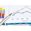 Close up of papers with graphs and diagrams