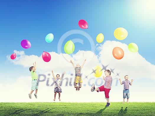 Group of happy children playing with colorful balloons Group of happy children playing with colorful balloons