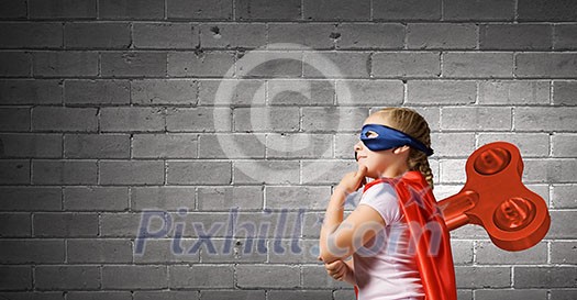 Little cute active girl with key on back
