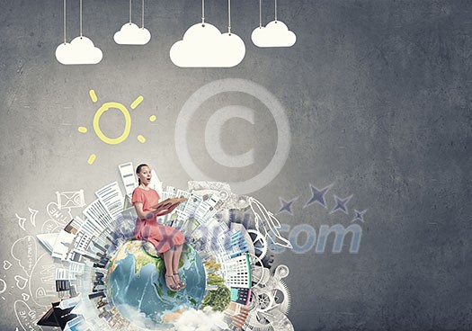 Young girl sitting on Earth planet and reading. Elements of this image are furnished by NASA Young girl sitting on Earth planet and reading. Elements of this image are furnished by NASA