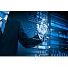 Businessman hand touching with finger virtual panel with infographs