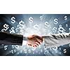 Close up of business handshake on digital background
