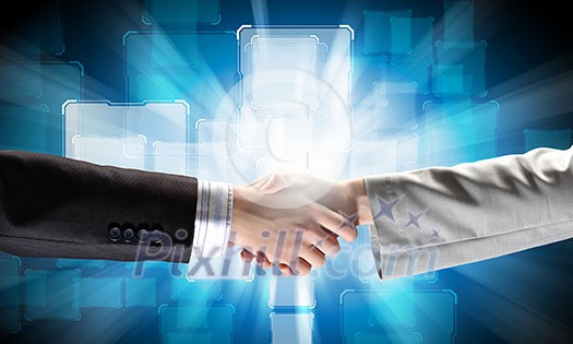Close up of business handshake on digital background Close up of business handshake on digital background