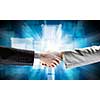 Close up of business handshake on digital background