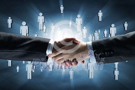 Close up of business handshake on digital background Close up of business handshake on digital background
