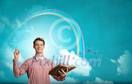 Young funny man with book in hands Young funny man with book in hands
