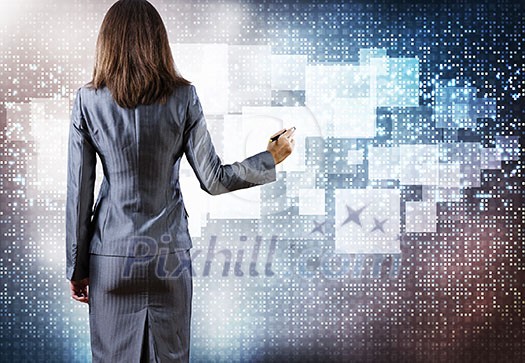 Rear view of businesswoman touching media screen with stylus Rear view of businesswoman touching media screen with stylus