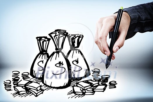 Close up of businessman drawing money bags Close up of businessman drawing money bags