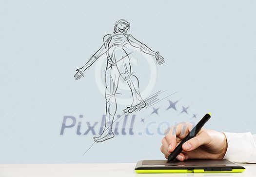 Close up of human hand using tablet for drawing Close up of human hand using tablet for drawing