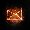 Email concept with light glowing symbol on dark background