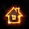 Glowing light house symbol on dark background