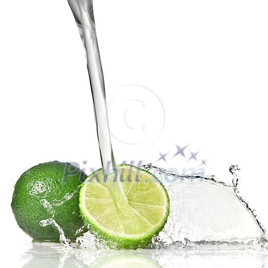 Water splash on lime isolated on white Water splash on lime isolated on white