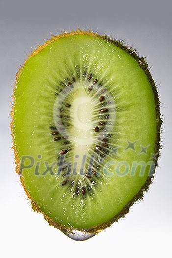 Close up kiwi with water drop Close up kiwi with water drop