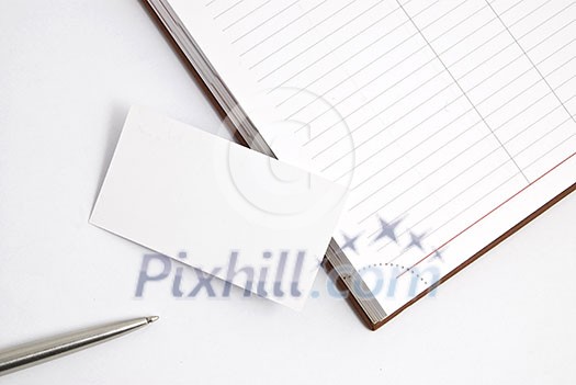 Empty business card with diary and pen isolated on white Empty business card with diary and pen isolated on white