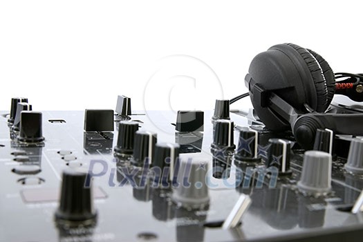 dj mixer with headphones isolated on white dj mixer with headphones isolated on white