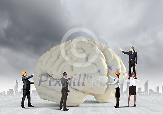 Huge human brain and many little businesspeople around Huge human brain and many little businesspeople around