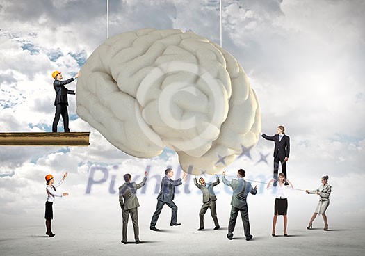 Huge human brain and many little businesspeople around Huge human brain and many little businesspeople around