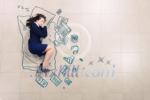 Tired businesswoman sleeping on floor and dreaming Tired businesswoman sleeping on floor and dreaming