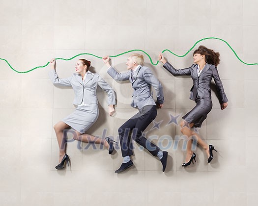 Funny businesspeople lying on floor and acting like running Funny businesspeople lying on floor and acting like running