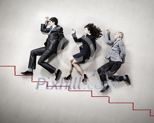 Funny businesspeople lying on floor and acting like running Funny businesspeople lying on floor and acting like running