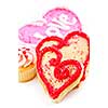 Homemade baked shortbread Valentine cookies and cupcake with icing on white background