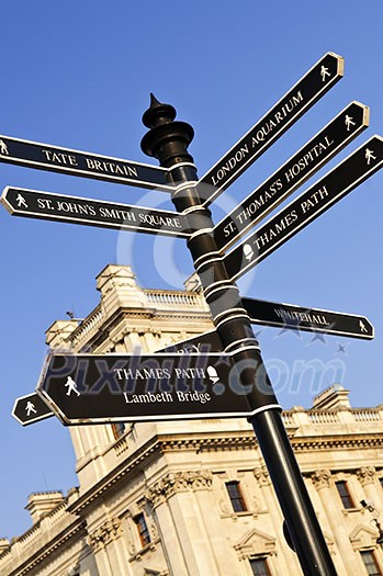 Signpost in Westminster London showing various attractions Signpost in Westminster London showing various attractions