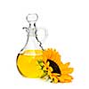 Sunflower oil bottle and flower isolated on white