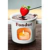 Strawberry dipped in delicious melted chocolate fondue