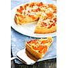 Slice of fresh baked apricot and almond pie dessert